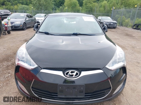 2012 Hyundai Veloster w/Gray Int with VIN KMHTC6AD6CU028810, listed as a IAAI auction lot 42818888 with 149,283 mi miles and . Bid and sale history available at DreamBid. Image 6.