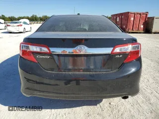 2014 Toyota Camry L with VIN 4T4BF1FK2ER376447, listed as a Copart auction lot 82886974 with 112,833 mi miles and Salvage Title. Bid and sale history available at DreamBid. Image 6.