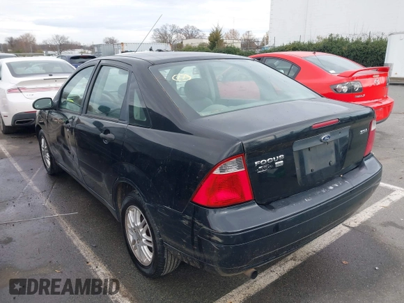 2005 Ford Focus S with VIN 1FAFP34N75W304479, listed as a IAAI auction lot 41117405 with 234,312 mi miles. Bid and sale history available at carsss.com. Image 3.