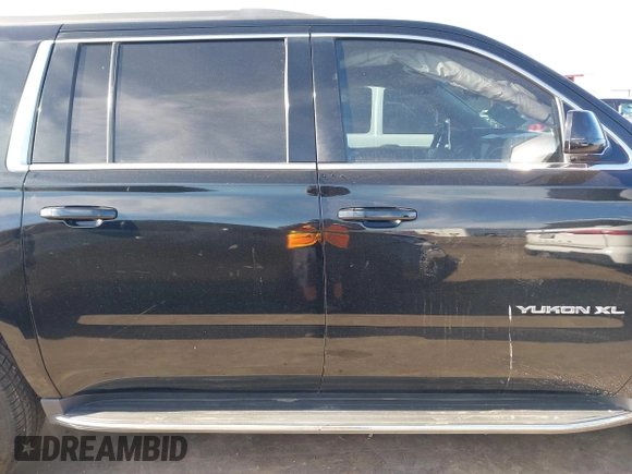 2016 GMC Yukon XL SLE with VIN 1GKS1FKC9GR442107, listed as a IAAI auction lot 41309092 with 130,117 mi miles. Bid and sale history available at carsss.com. Image 14.