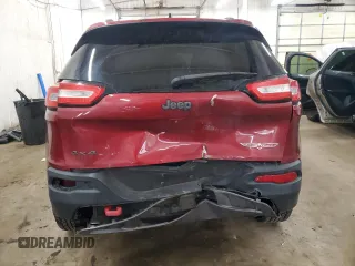 2015 Jeep Cherokee Trailhawk z VIN 1C4PJMBS9FW509642, wystawiony jako Copart lot #52385555 z przebiegiem 135 477 mil mil oraz Szkoda całkowita • Salvage title. Historia ofert i sprzedaży dostępna na DreamBid. Obrazek 6.