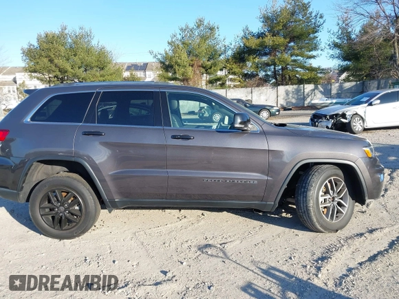 2021 Jeep Grand Cherokee 80th Anniversary z VIN 1C4RJFBG5MC737412, wystawiony jako IAAI lot #41753550 z przebiegiem 54 921 mil mil oraz . Historia ofert i sprzedaży dostępna na DreamBid. Obrazek 13.