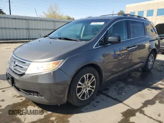 2013 Honda Odyssey EX-L with VIN 5FNRL5H6XDB017433, listed as a Copart auction lot 52306755 with 144,036 mi miles and Clean Title. Bid and sale history available at carsss.com. Image 1.