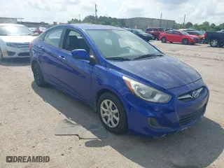 2014 Hyundai Accent GLS with VIN KMHCT4AE6EU668905, listed as a IAAI auction lot 42101035 with 151,809 mi miles. Bid and sale history available at carsss.com. Image 1.