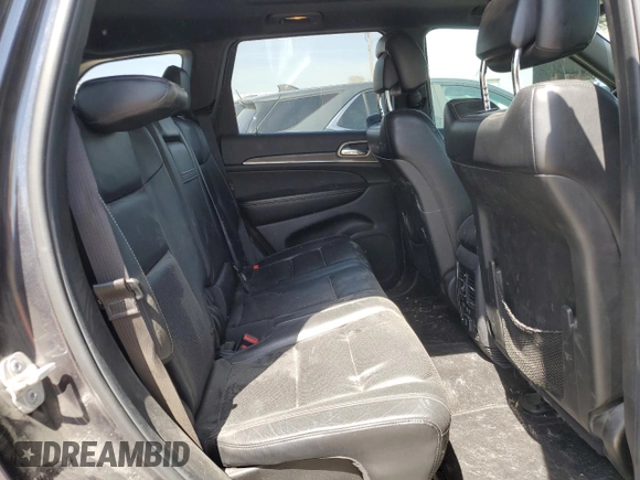 2014 Jeep Grand Cherokee Limited with VIN 1C4RJFBG4EC265947, listed as a Copart auction lot 52448155 with 127,700 mi miles and Salvage title. Bid and sale history available at DreamBid. Image 12.