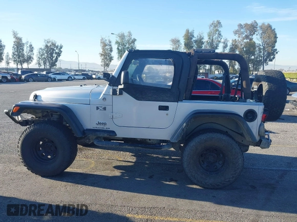 2005 Jeep Wrangler X with VIN 1J4FA39S55P348432, listed as a IAAI auction lot 41868451 with 166,876 mi miles. Bid and sale history available at carsss.com. Image 14.