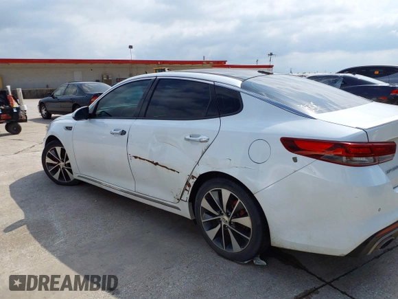 2016 Kia Optima SXL Turbo with VIN 5XXGV4L26GG015874, listed as a IAAI auction lot 42127366 with 166,970 mi miles. Bid and sale history available at carsss.com. Image 14.