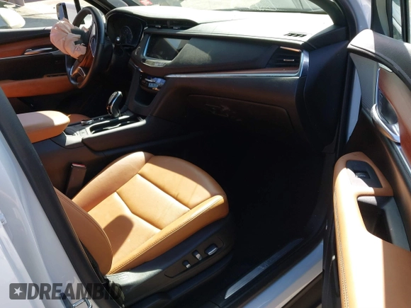 2023 Cadillac XT5 AWD Premium Luxury with VIN 1GYKNDRS4PZ195431, listed as a IAAI auction lot 41714459 with 13,207 mi miles and . Bid and sale history available at DreamBid. Image 5.