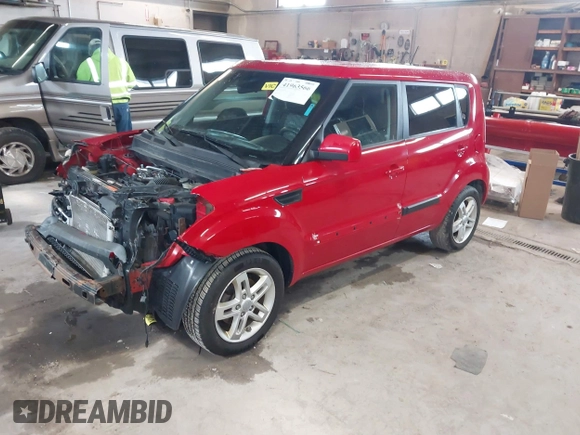 2011 Kia Soul + with VIN KNDJT2A23B7329051, listed as a IAAI auction lot 41963566 with 146,063 mi miles. Bid and sale history available at carsss.com. Image 2.