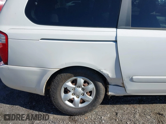 2009 Kia Sedona LX with VIN KNDMB233096312990, listed as a IAAI auction lot 41261428 with 254,323 mi miles. Bid and sale history available at carsss.com. Image 6.