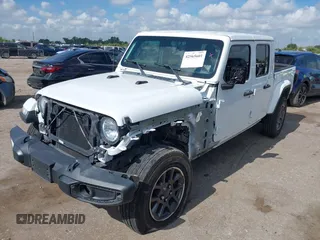 2020 Jeep Gladiator Overland z VIN 1C6HJTFGXLL180622, wystawiony jako IAAI lot #42565601 z przebiegiem 63 738 mil mil oraz . Historia ofert i sprzedaży dostępna na DreamBid. Obrazek 18.