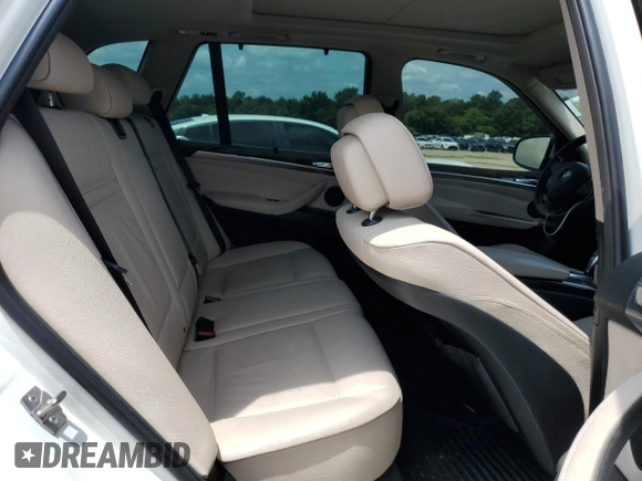 2012 BMW X5 35i с VIN 5UXZV4C58CL987049, выставлен на аукционе Copart как лот 61013925 с пробегом 167 508 миль миль и Чистый • Clean title. История ставок и продаж доступна на DreamBid. Изображение 11.