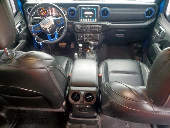 2023 Jeep Wrangler Sahara with VIN 1C4HJXEG7PW590252, listed as a Copart auction lot 59377765 with 32,689 mi miles and Salvage title. Bid and sale history available at DreamBid. Image 8.