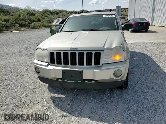 2007 Jeep Grand Cherokee Laredo z VIN 1J8GR48K17C596514, wystawiony jako Copart lot #54404755 z przebiegiem 230 033 mil mil oraz Szkoda całkowita • Salvage title. Historia ofert i sprzedaży dostępna na DreamBid. Obrazek 14.