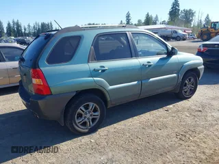 2006 Kia Sportage LX with VIN KNDJE723667170725, listed as a IAAI auction lot 42347100 with 153,002 mi miles and . Bid and sale history available at DreamBid. Image 4.