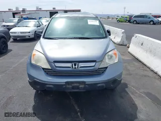 2007 Honda CR-V EX with VIN JHLRE38547C037459, listed as a IAAI auction lot 41902256 with 211,395 mi miles. Bid and sale history available at carsss.com. Image 6.
