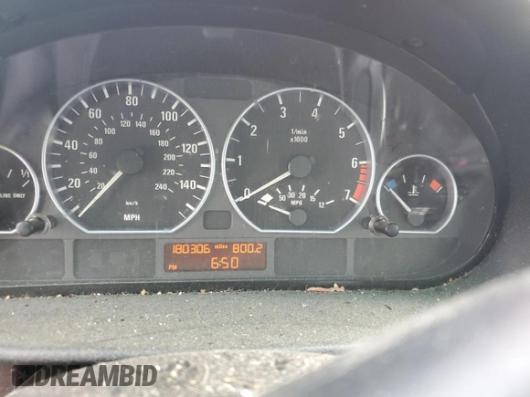 2002 BMW 3 Series 330xi with VIN WBAEW53482PG08312, listed as a Copart auction lot 80872734 with 180,306 mi miles and Salvage title. Bid and sale history available at DreamBid. Image 9.