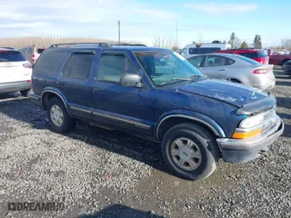 1999 Chevrolet Blazer LS with VIN 1GNDT13W3X2139883, listed as a IAAI auction lot 41526982 with 242,231 mi miles. Bid and sale history available at carsss.com. Image 1.