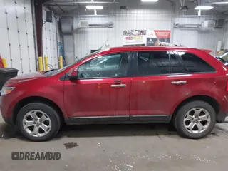 2011 Ford Edge SEL with VIN 2FMDK4JC4BBA38257, listed as a IAAI auction lot 41216860 with 148,351 mi miles. Bid and sale history available at carsss.com. Image 14.