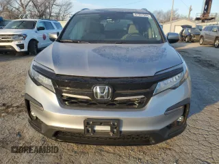 2020 Honda Pilot Touring 8-Passenger with VIN 5FNYF6H96LB029385, listed as a Copart auction lot 87391534 with 68,201 mi miles and Salvage Title. Bid and sale history available at DreamBid. Image 5.