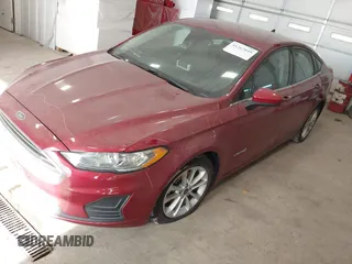 2019 Ford Fusion Hybrid SE with VIN 3FA6P0LUXKR205712, listed as a IAAI auction lot 41267049 with 124,687 mi miles. Bid and sale history available at carsss.com. Image 2.