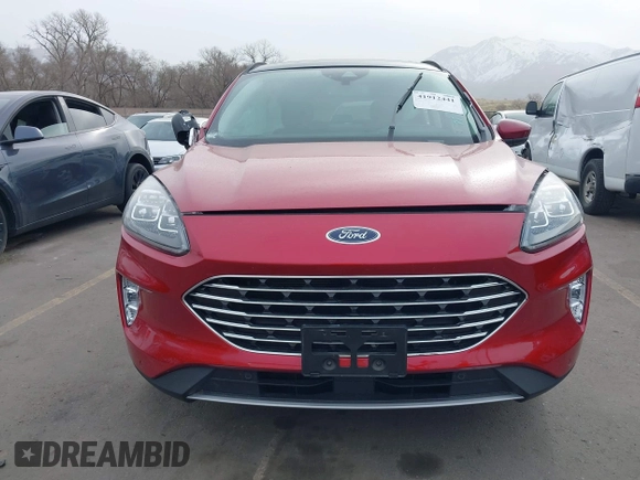 2021 Ford Escape Titanium Hybrid with VIN 1FMCU9DZ1MUA01599, listed as a IAAI auction lot 41912441 with 20,660 mi miles and . Bid and sale history available at DreamBid. Image 11.