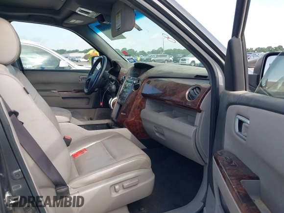 2011 Honda Pilot EX-L z VIN 5FNYF3H53BB022145, wystawiony jako IAAI lot #42403368 z przebiegiem 199 360 mil mil oraz . Historia ofert i sprzedaży dostępna na DreamBid. Obrazek 5.