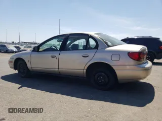 2000 Saturn SL with VIN 1G8ZK5274YZ103237, listed as a Copart auction lot 60558105 with 126,320 mi miles and Salvage title. Bid and sale history available at DreamBid. Image 2.
