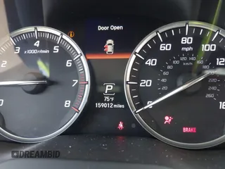 2014 Acura MDX with VIN 5FRYD4H22EB003896, listed as a IAAI auction lot 42014850 with 159,012 mi miles. Bid and sale history available at carsss.com. Image 7.