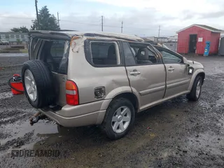 2001 Suzuki XL7 Standard z VIN JS3TX92VX14114699, wystawiony jako IAAI lot #41085552 z przebiegiem 195 316 mil mil oraz . Historia ofert i sprzedaży dostępna na DreamBid. Obrazek 4.