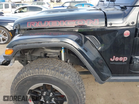 2020 Jeep Wrangler Unlimited Rubicon with VIN 1C4HJXFG1LW141335, listed as a IAAI auction lot 42724973 with 59,843 mi miles and . Bid and sale history available at DreamBid. Image 18.