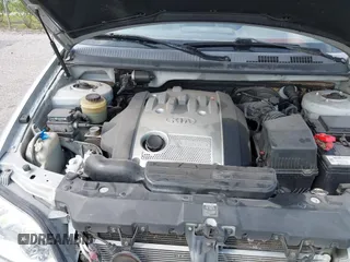 2003 Kia Sedona LX with VIN KNDUP131236417368, listed as a IAAI auction lot 41863624 with 142,896 mi miles. Bid and sale history available at carsss.com. Image 10.