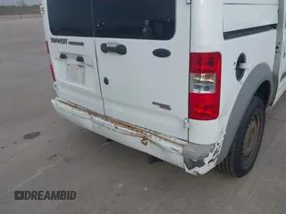 2013 Ford Transit Connect XLT with VIN NM0LS7DN3DT130085, listed as a IAAI auction lot 40972391 with Not provided miles and . Bid and sale history available at DreamBid. Image 14.