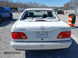1999 Mercedes-Benz E-Class with VIN WDBJF82H4XX025925, listed as a IAAI auction lot 41839398 with 238,583 mi miles. Bid and sale history available at carsss.com. Image 16.