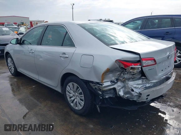 2014 Toyota Camry L with VIN 4T4BF1FK6ER443115, listed as a IAAI auction lot 41554763 with 54,663 mi miles. Bid and sale history available at carsss.com. Image 3.