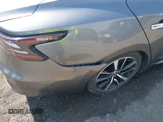 2022 Nissan Maxima SV z VIN 1N4AA6CV4NC502047, wystawiony jako IAAI lot #42073262 z przebiegiem 54 530 mil mil oraz . Historia ofert i sprzedaży dostępna na DreamBid. Obrazek 19.