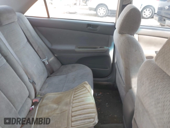 2003 Toyota Camry LE with VIN 4T1BE32K03U727447, listed as a IAAI auction lot 42118785 with 325,881 mi miles and . Bid and sale history available at DreamBid. Image 8.