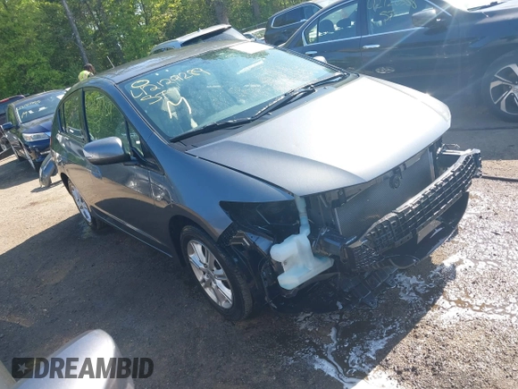 2010 Honda Insight EX with VIN JHMZE2H72AS021555, listed as a IAAI auction lot 42129289 with 172,829 mi miles and . Bid and sale history available at DreamBid. Image 1.