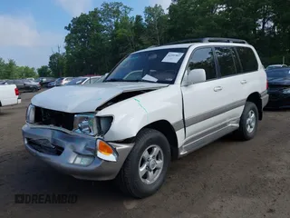 2000 Toyota Land Cruiser z VIN JT3HT05J4Y0084531, wystawiony jako IAAI lot #42381507 z przebiegiem 184 478 mil mil oraz . Historia ofert i sprzedaży dostępna na DreamBid. Obrazek 2.