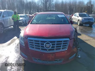 2014 Cadillac XTS Luxury z VIN 2G61N5S34E9163874, wystawiony jako IAAI lot #41649292 z przebiegiem 104 638 mil mil oraz . Historia ofert i sprzedaży dostępna na DreamBid. Obrazek 12.
