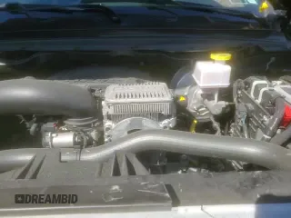 2024 Ram 1500 Big Horn with VIN 1C6SRFBT0RN210968, listed as a Copart auction lot 49988365 with 7,678 mi miles and Salvage title. Bid and sale history available at DreamBid. Image 16.