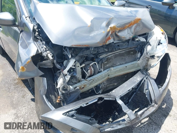 2016 Nissan Versa S z VIN 3N1CN7AP4GL831763, wystawiony jako IAAI lot #42243154 z przebiegiem 89 322 mil mil oraz . Historia ofert i sprzedaży dostępna na DreamBid. Obrazek 6.