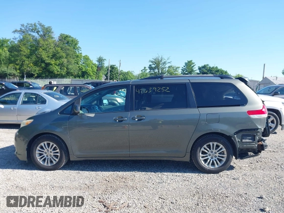 2011 Toyota Sienna XLE AAS with VIN 5TDYK3DC4BS136568, listed as a IAAI auction lot 42639252 with 239,020 mi miles and . Bid and sale history available at DreamBid. Image 14.