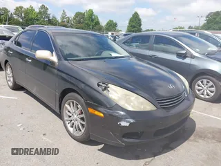 2002 Lexus ES 300 z VIN JTHBF30G925030477, wystawiony jako IAAI lot #42324394 z przebiegiem 186 078 mil mil oraz . Historia ofert i sprzedaży dostępna na DreamBid. Obrazek 1.