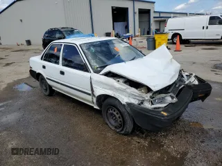 1990 Toyota Corolla z VIN JT2AE94A5L3323663, wystawiony jako Copart lot #71963834 z przebiegiem 354 386 mil mil oraz Szkoda całkowita • Salvage title. Historia ofert i sprzedaży dostępna na DreamBid. Obrazek 4.