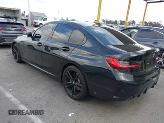 2023 BMW 3 Series 330i with VIN 3MW69FF00P8D17350, listed as a IAAI auction lot 41447178 with 23,372 mi miles. Bid and sale history available at carsss.com. Image 3.