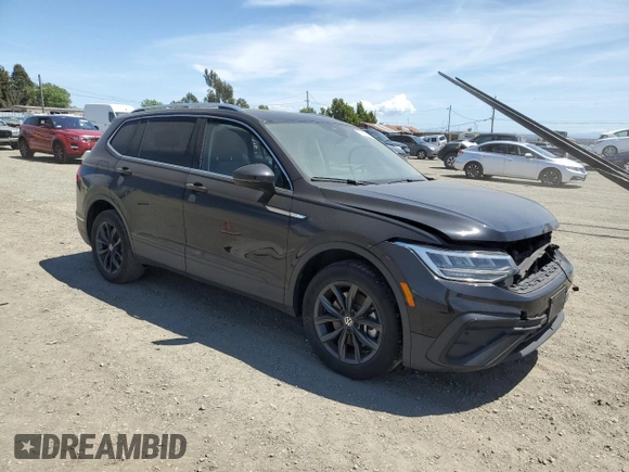 2022 Volkswagen Tiguan SE with VIN 3VV3B7AX2NM077616, listed as a Copart auction lot 57145995 with 53,495 mi miles and Salvage title. Bid and sale history available at DreamBid. Image 4.