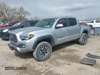 2023 Toyota Tacoma 4WD SR with VIN 3TMCZ5AN0PM609672, listed as a IAAI auction lot 41830191 with 24,244 mi miles. Bid and sale history available at carsss.com. Image 17.