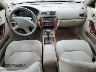 2001 Mitsubishi Galant ES z VIN 4A3AA46G51E020677, wystawiony jako Copart lot #87795655 z przebiegiem 61 145 mil mil oraz Tytuł czysty. Historia ofert i sprzedaży dostępna na DreamBid. Obrazek 8.
