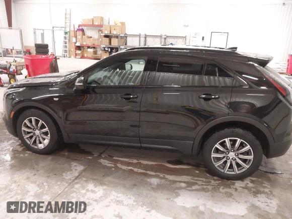 2020 Cadillac XT4 AWD Sport with VIN 1GYFZFR43LF090264, listed as a IAAI auction lot 41261586 with 65,859 mi miles and . Bid and sale history available at DreamBid. Image 14.